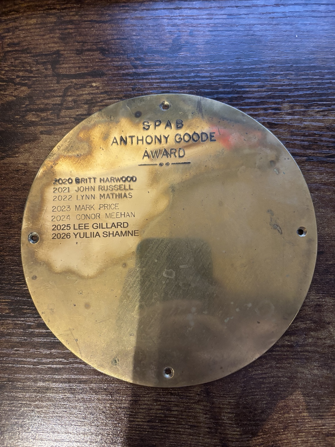 Brass Anthony Goode award plate with additional winners’ names added