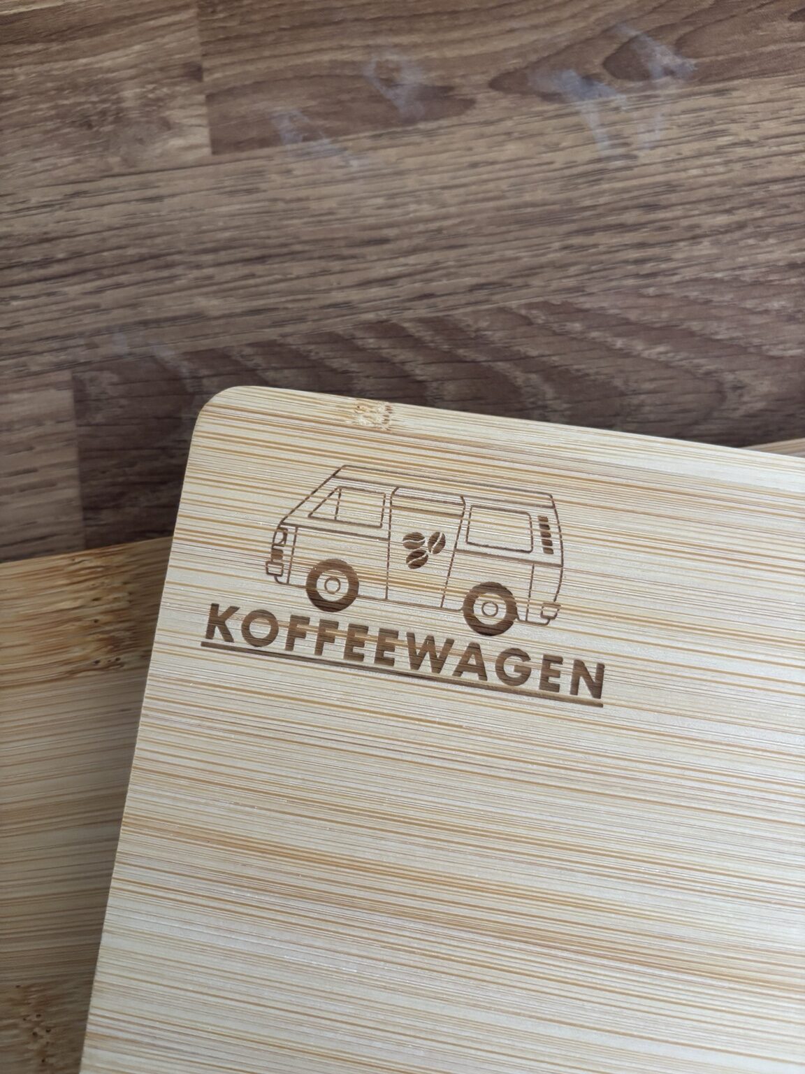 Koffeewagen logo engraved onto a bamboo board