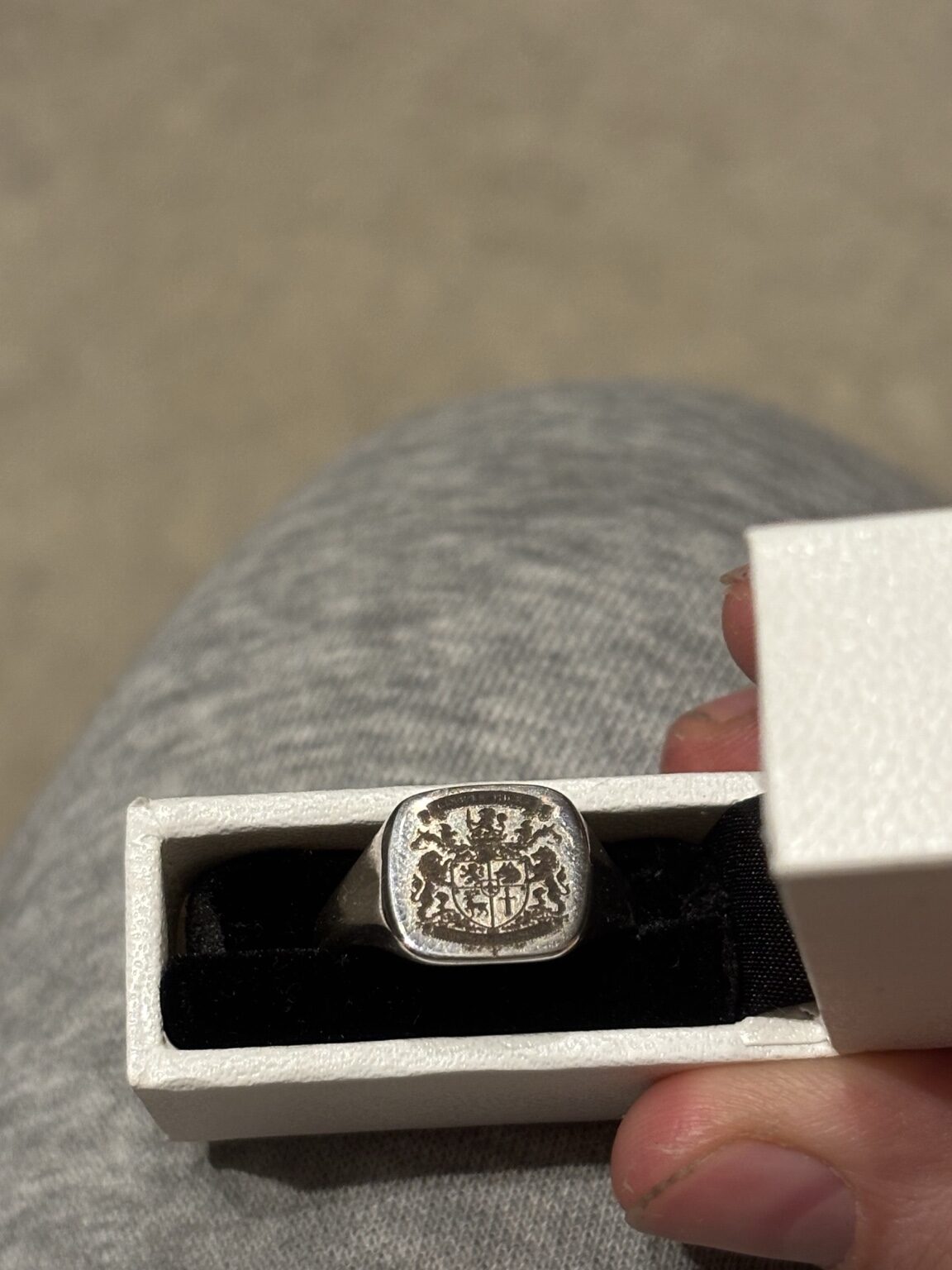 Detailed family crest engraved onto a signet ring