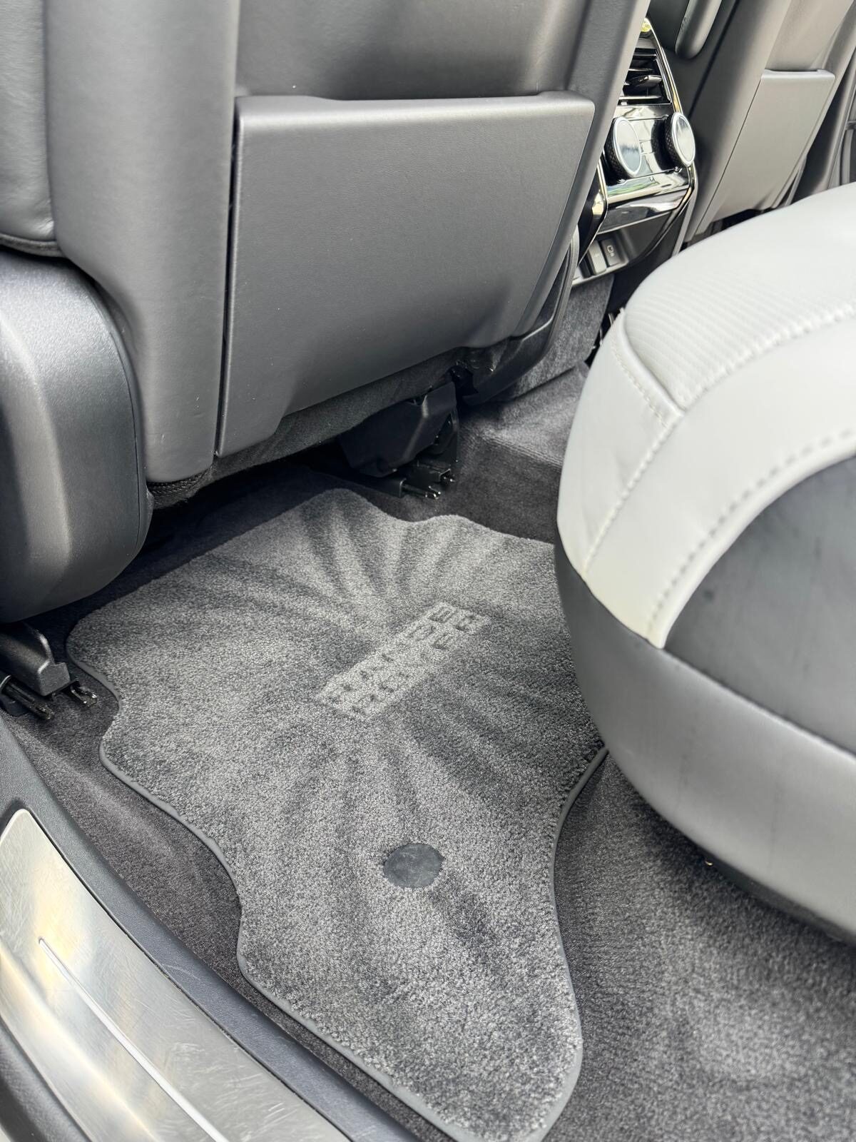 Range Rover logo produced on vehicle carpet using the stencil